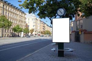 Blank billboard mock up on city road for text message or content. photo