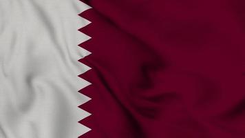 bandera de qatar Video de bucle de bandera 3d ondeando en el viento. fondo de la bandera de qatar doha.