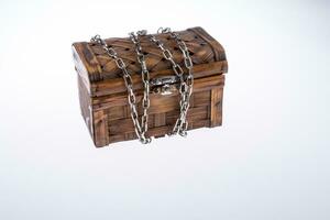 Wooden treasure box in chains photo