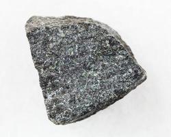 rough Gabbro stone on white photo