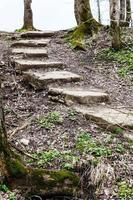 stone steps from ravine in spring photo