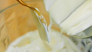 Macro filming of Worcestershire sauce. The chef pours the sauce into a spoon video