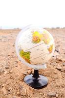 World map on desert photo