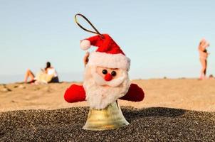 Santa Claus ornament on the ground photo