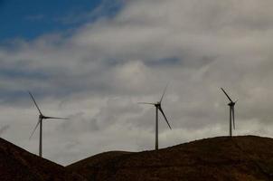 Wind turbines on hills photo