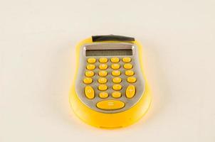 Yellow calculator closeup photo