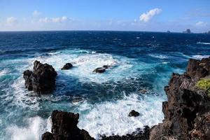 Blue ocean and rocks photo