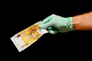 Hand holding Euro cash photo