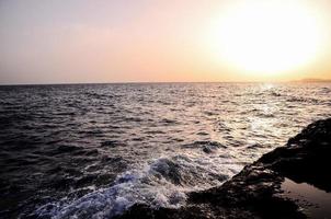 Waves by the sea coast photo