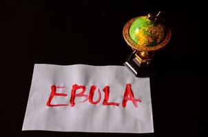Ebola written on paper photo