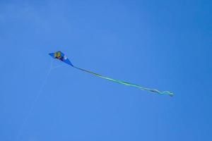 Kite in sky photo