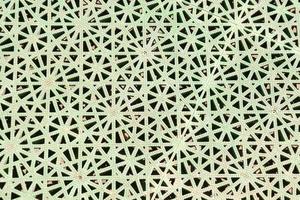 Green metal with geometric pattern photo