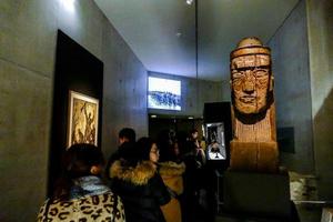 Unidentified people and artwork in the Musee d Orsay in Paris, France, circa October 2022 photo