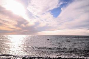 Sunset over the ocean photo