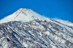 Snowy mountains view photo