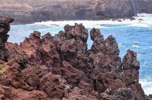 Rocky shoreline in summer photo