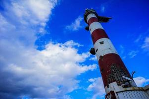 Lighthouse by the sea photo