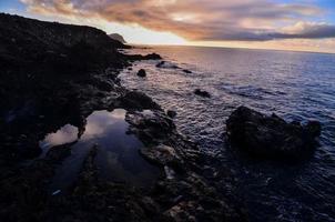 Rocks on the ocean photo