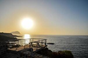 Sunset over the ocean photo