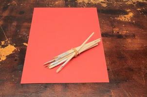 Paper and art materials on the table photo