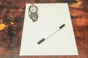 Paper and art materials on the table photo