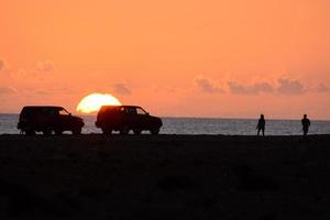 Sunset over the ocean photo