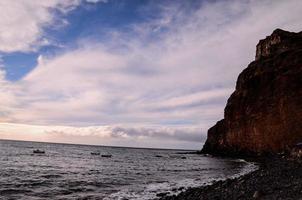 Rocky shoreline in summer photo