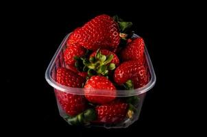 Strawberries in container photo