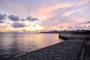 Sunset over the ocean photo