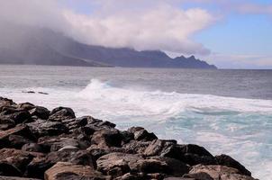 Rocky shoreline in summer photo