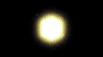 rétrécissement de la sphère d'une particule dorée sur un gros plan de fond noir video