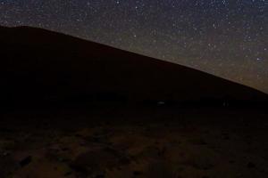 Starry sky over mountain photo