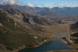 lake hidden between the mountais photo