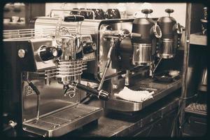 Dubai, UAE, 2022 - old vintage coffee machine on counter in cafe. Coffee museum in Dubai creek. photo