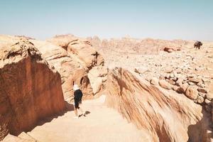 Tourist walk in Petra, Jordan photo