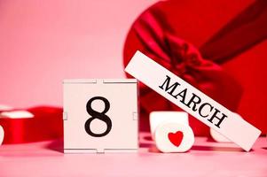 Calendar with 8 march date ,sweets and gifts around.Women's day photo