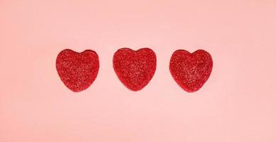 Red hearts on pink background. Mother's day,valentine's,women's day concept photo