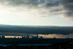 Istanbul cityscape below clouds photo