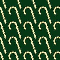 Pattern of yellow lollipop on dark green background vector