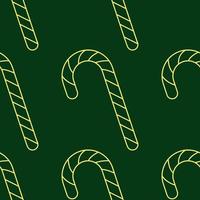 patrón vectorial sin costuras de palo de caramelo amarillo sobre fondo verde oscuro vector