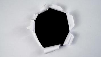 Round torn paper stop motion for copy space. Ripped paper animation for video effect overlay