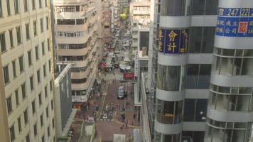 HONG KONG NOVEMBER 8, 2019 - Aerial view Bowring street crossroad with Nathan road, timelapse. View from Prudential Hotel video