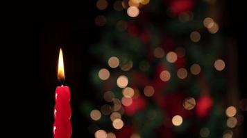Red candle light for Christmas celebration, Xmas background. Wax candlelight. video
