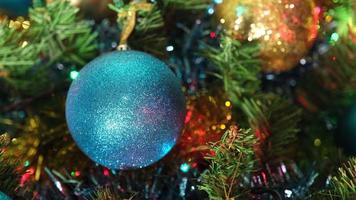 Christmas decoration close up on Pine Tree at the Christmas Eve. Balls or baubles video