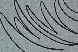 Abstract design background of grey coarse-grained intersection texture of rough fabric with an interlacing black painted lines. Linen sack textile canvas burlap cloth. Close-up, mock up, top view photo