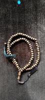 Prayer beads that is above the prayer rug photo