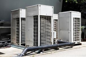 Large compressors air conditioners of office building photo