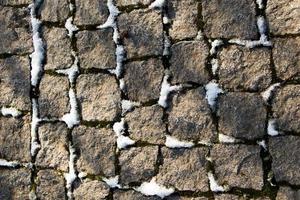 texture background of cobblestone paved street photo
