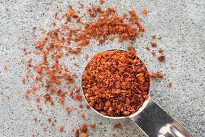 Aleppo Peppers Spilled from a Teaspoon photo