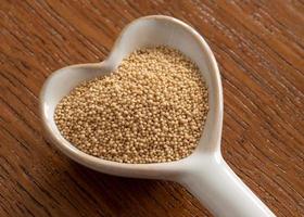 Uncooked Amaranth Grain in a Heart Shape photo